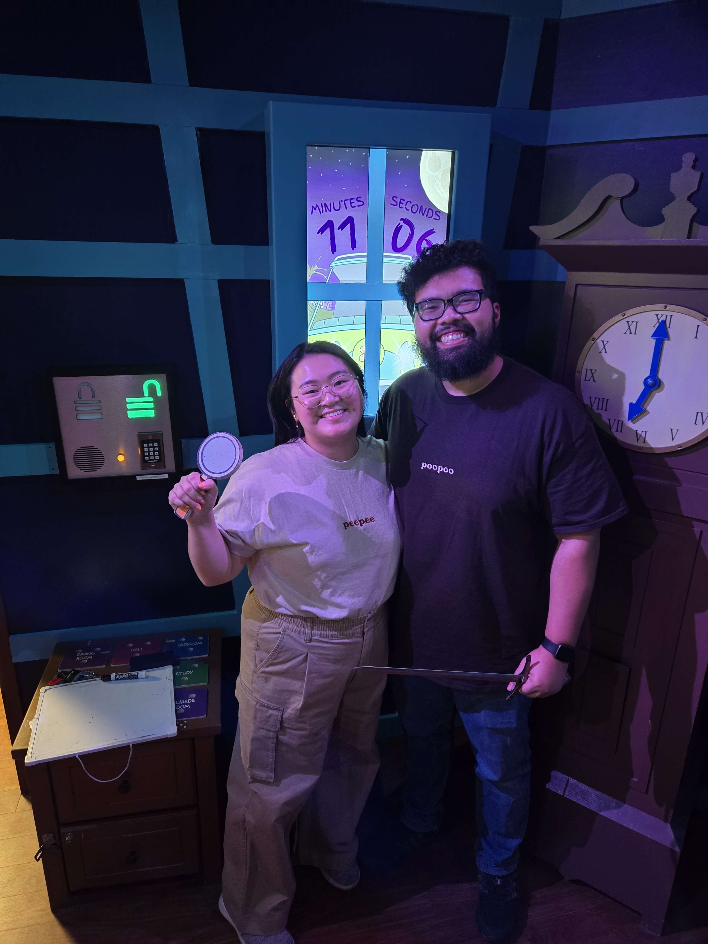 a man and a woman in a scooby-doo themed room