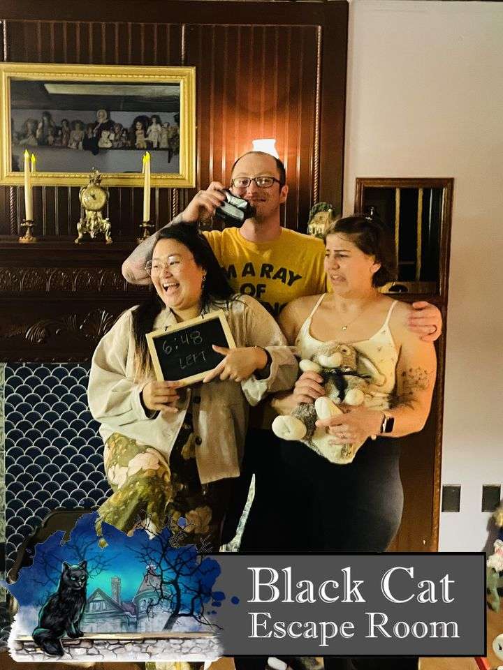 one boy and two girls standing in front of a fireplace looking scared